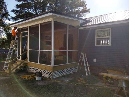 New screen-in back porch.