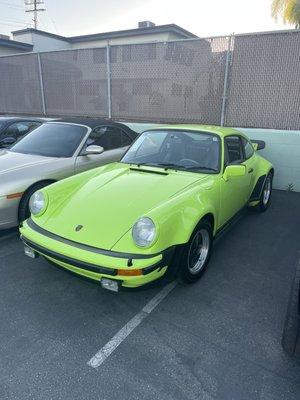 His shop is full of beautiful Porsches.