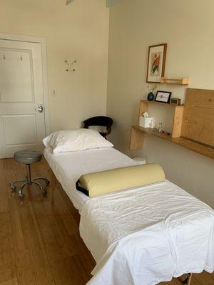 View of the Reiki treatment space that will rented for your session. Room type may vary.