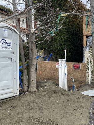 Porta potty that is now too dangerous to move!!  Seriously that's what we were told.