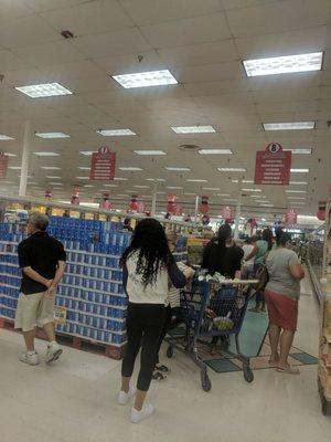 All the checkout lines  are stretch to the back of the store