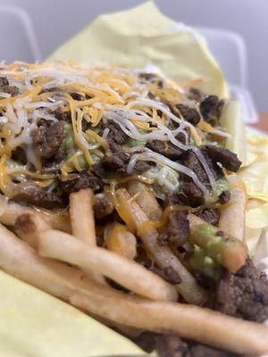 More toppings on the fries side of my half-Carne Asada Nachos & half-Carne Asada Fries