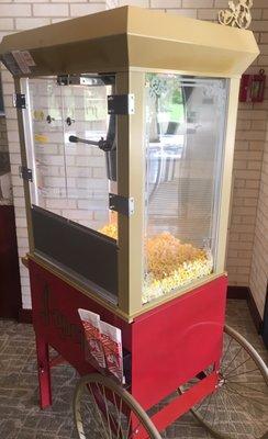 Companies popcorn machine, they make the popcorn on Friday's & special events days.