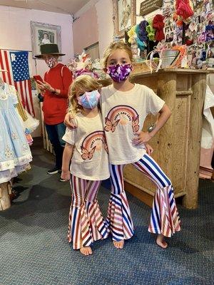 The little girls posing in their new outfits.