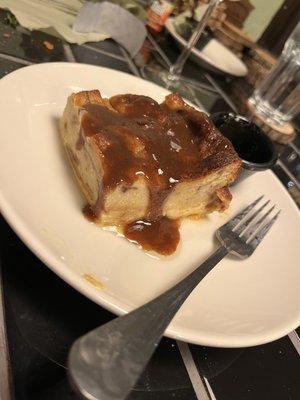 Bread pudding with cinnamon rum sauce.