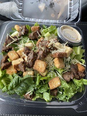 Caesar salad with steak tips