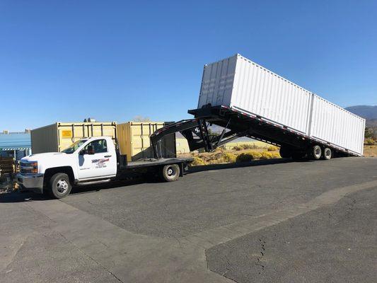 40' containers delivered with our own 4x4 with gooseneck trailer.