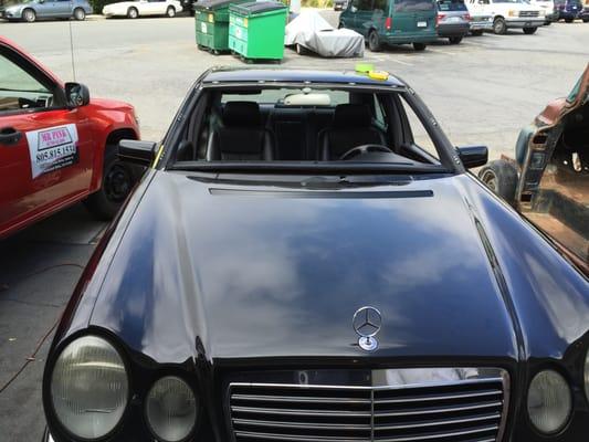 1997 Mercedes E320 - New windshield going in! Mr. Pink mobile truck in the background, we come to you too!