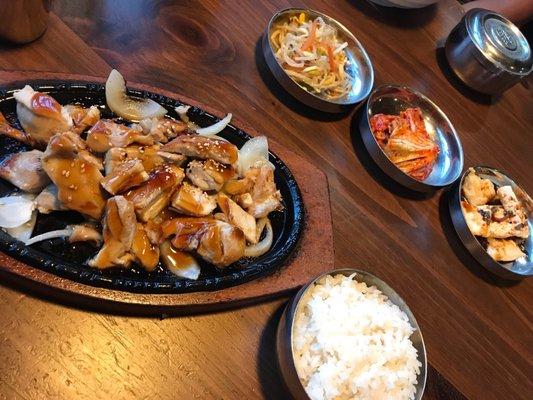 Chicken platter with banchan.