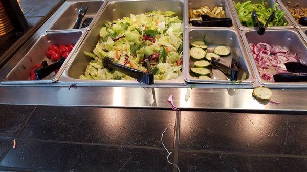 Messy salad bar.