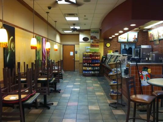 It's only 7pm. The chairs are already up and the restaurant is vacant while the two employees are outside smoking.