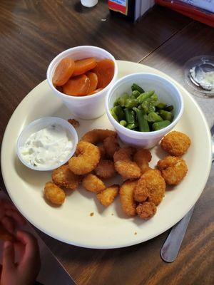 Kids portion of popcorn shrimp with carrots and green beans