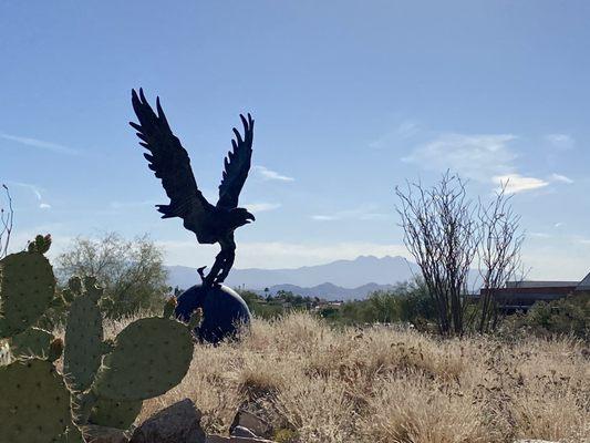 The gorgeous view of the Four Peaks along with our Falcon Nest statue.