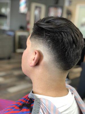 Skin dropped fade with sleek back.