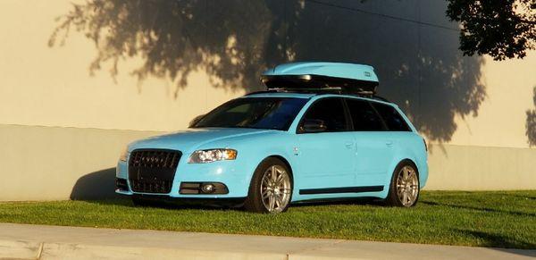 Full wrap in 3M Sky Blue and Matte Deep Black.  Tinted windows in Rayno S7 20% all the way around.