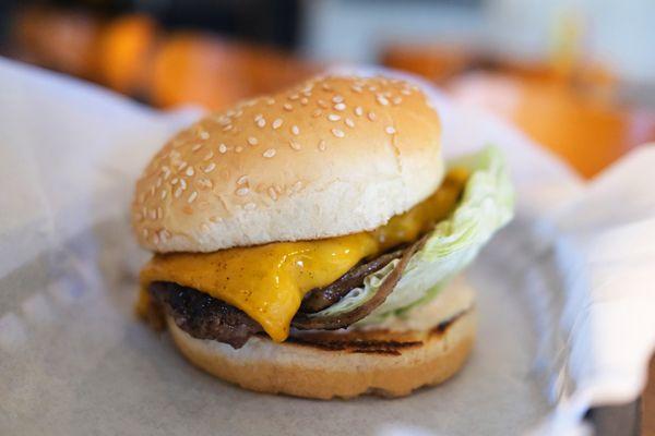 inclined burger. yum.  i like to add an extra pinch of salt and extra onion and tomato