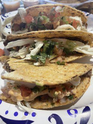 Hard shell tacos with ground beef, pico de gallo, oaxaca cheese, and chipotle mayo.