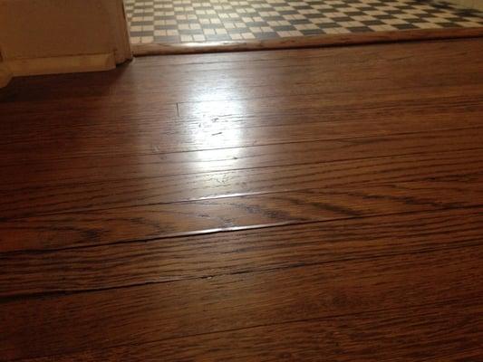 Cracks in my floors after Terry refinished them. He wouldn't credit me any money to fix them.