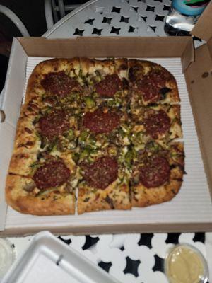 V blurry pic of Mike's Sicilian pizza