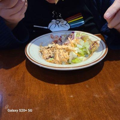 Small dinner salad with thousand Island dressing.