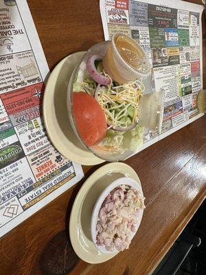 Side salad and coleslaw.