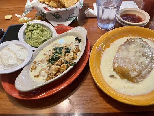 Guacamole, sour cream, chili rellano, chicken-spinach-sour cream sauce.