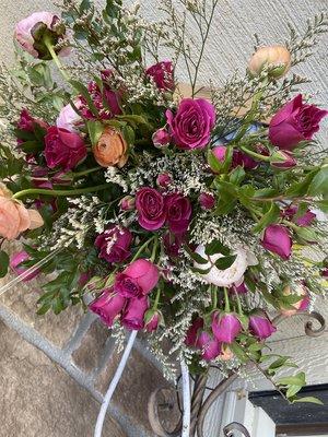 Arrangement of ranunculus, spray roses, and peonies delivered to a customer in Dublin