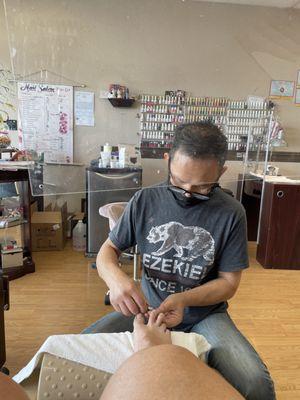 Mike doing my pedicure!