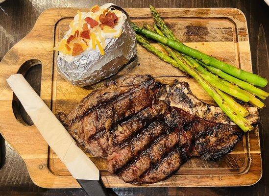 Ribeye with asparagus and baked potato