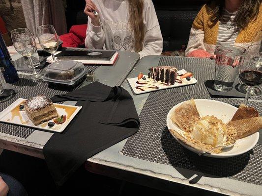 Flourless chocolate cake, tiramisu, and whipped fig, cheese and nuts crepes with gelato.