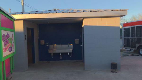 food truck plaza's sink and restroom