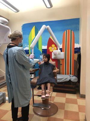 My 5yr old was initially too shy to even sit in the patient chair, but here she is taking X-rays!