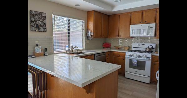 Kitchen-new quartz, backsplash, and knobs