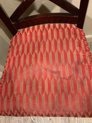 stained chair seat