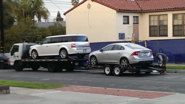 The volvo loaded onto the toe truck