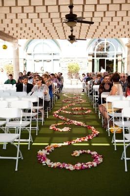 Outdoor ceremonies in our beautiful Rose Garden.  Guests are shaded and cooled by our beautiful fans