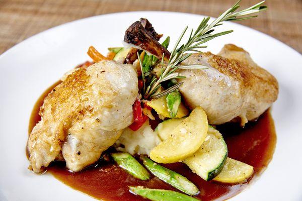 Rosemary Chicken - Garlic rosemary roasted chicken served with bordelaise, roasted grlic mashed potatoes, and mixed vegetables.