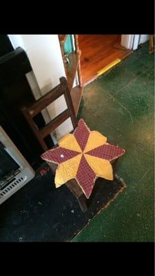 Large quilted star as a chair pad.