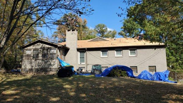 Remove all shingles and felt to a wood decking