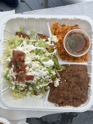 Empanadas, refried beans & rice