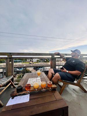 Beers on the second floor outside patio.