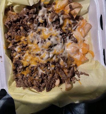 "Super"Nachos, not very super, meat, chips, shredded cheese(didn't melt), drizzle of crema, and that's it for $14!  Not worth it.