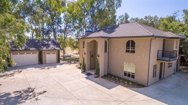 Detached 3 car garage and numerous other outbuildings.