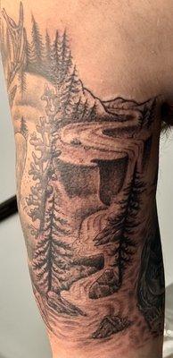 Nature scene tattoo