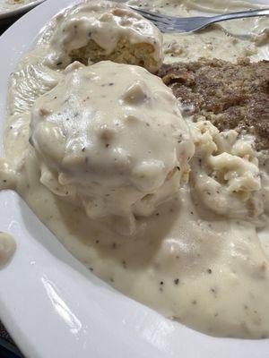 Sausage biscuits and gravy, they make the gravy patties themselves it appears, and then the pieces are mixed into the gravy