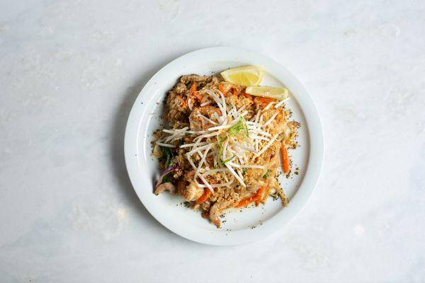 Pad Thai - rice noodles stir fried with chicken, shirmp, egg, and veggies, in an authentic tamarind sauce.