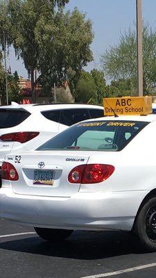 June 22 - male instructor (no student in car) did not stop for two adults in the crosswalk at this business. Hmmm.