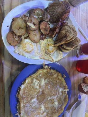 This is the doghouse breakfast, two eggs, potato sausage, bacon, toast, and your choice of pancake or biscuits and gravy. It's only $10!