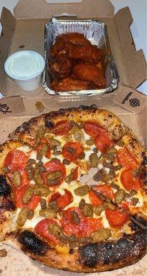 The meat pizza (no bacon) with traditional Buffalo wings