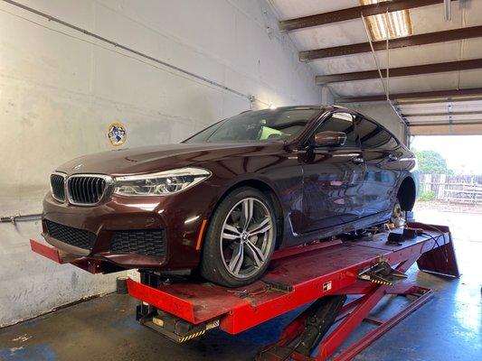 2018 BMW 640i GT getting a wheel balance and alignment at Jerry's.